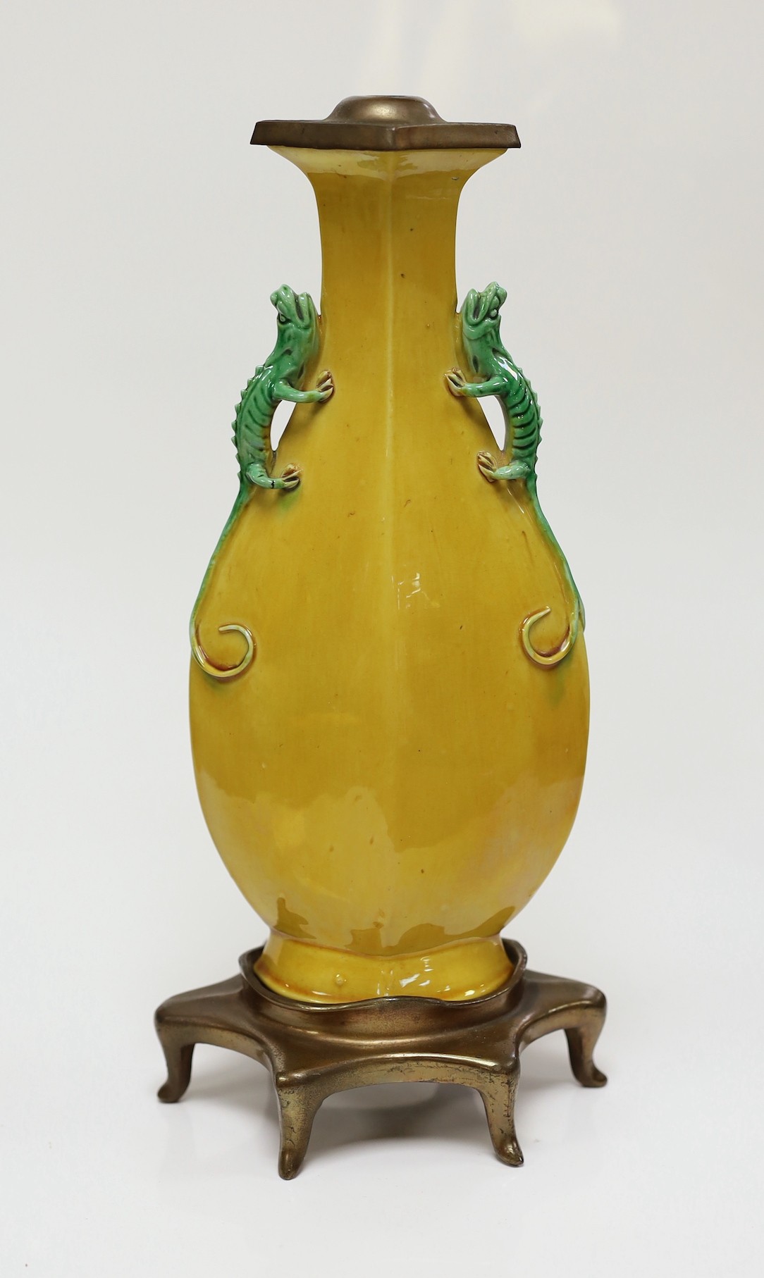 An early 20th century Chinese sancai glaze vase with lizard handle decoration, with lamp mount, 25cm tall